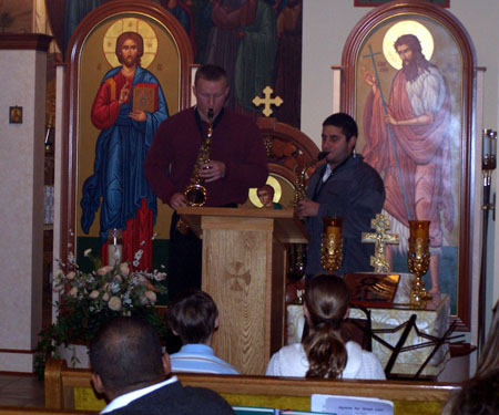 Altar Servers perform on saxophone